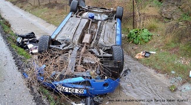 Devrilen otomobilde 2 kişi yaralandı