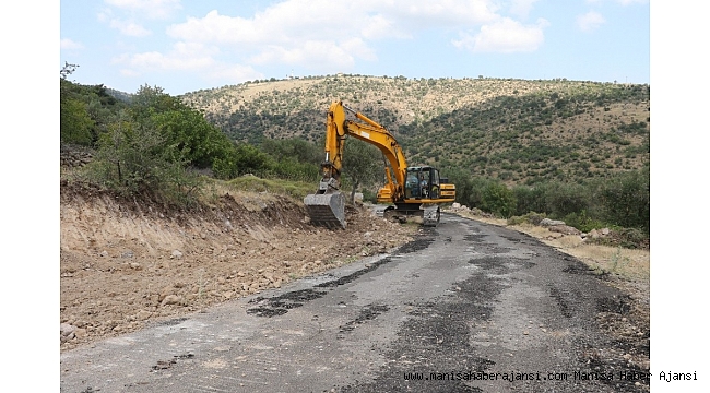 Manisa&#039;da yol genişletme ve asfaltlama çalışması