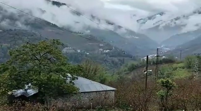 Maçka İlçesi Hızarlı Mahallesinde sis bulutları, kartpostallık eşsiz bir nanzara oluşturdu.